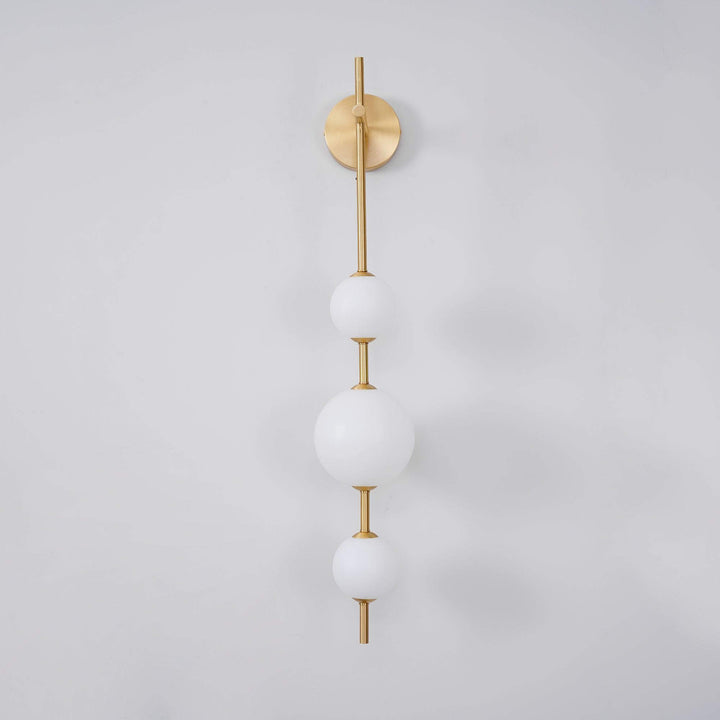 Applique murale boule verticale aspect doré