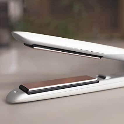 Fer à friser et lisseur 2 en 1 pour une coiffure polyvalente