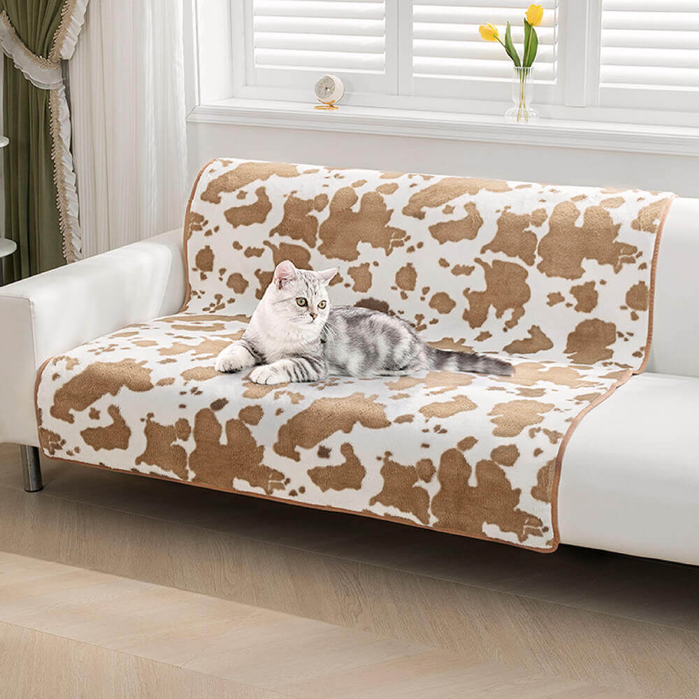 Kuschelige Haustierdecke Kuhmuster