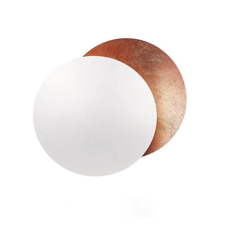 Goldene Wandleuchte mit Sonnenfinsternis-Effekt