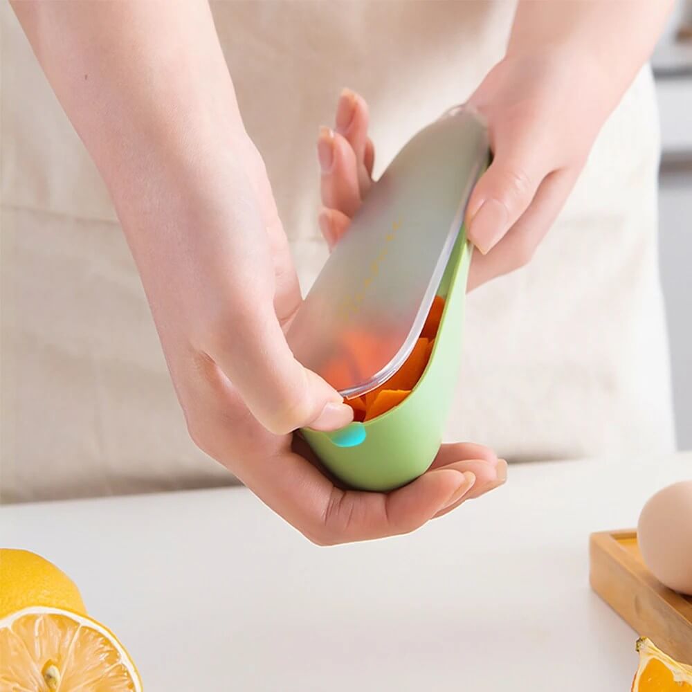 Éplucheur de légumes avec bac de récupération