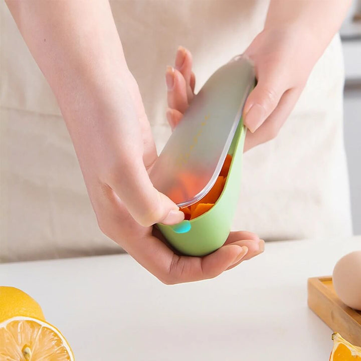 Éplucheur de légumes avec bac de récupération