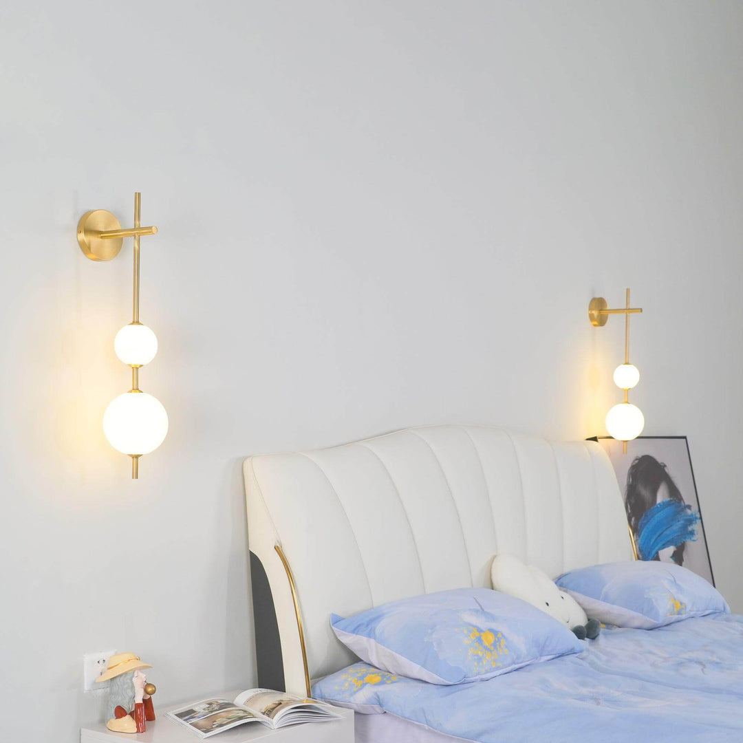 Applique murale boule verticale aspect doré