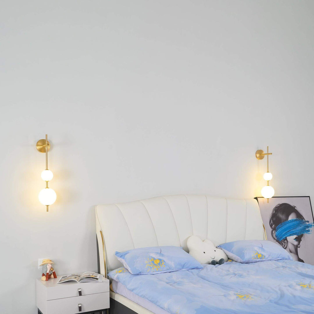 Applique murale boule verticale aspect doré