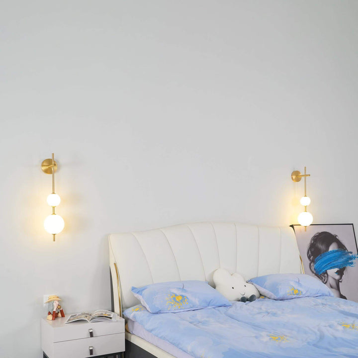 Applique murale boule verticale aspect doré