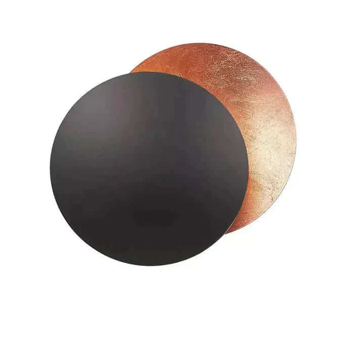 Goldene Wandleuchte mit Sonnenfinsternis-Effekt