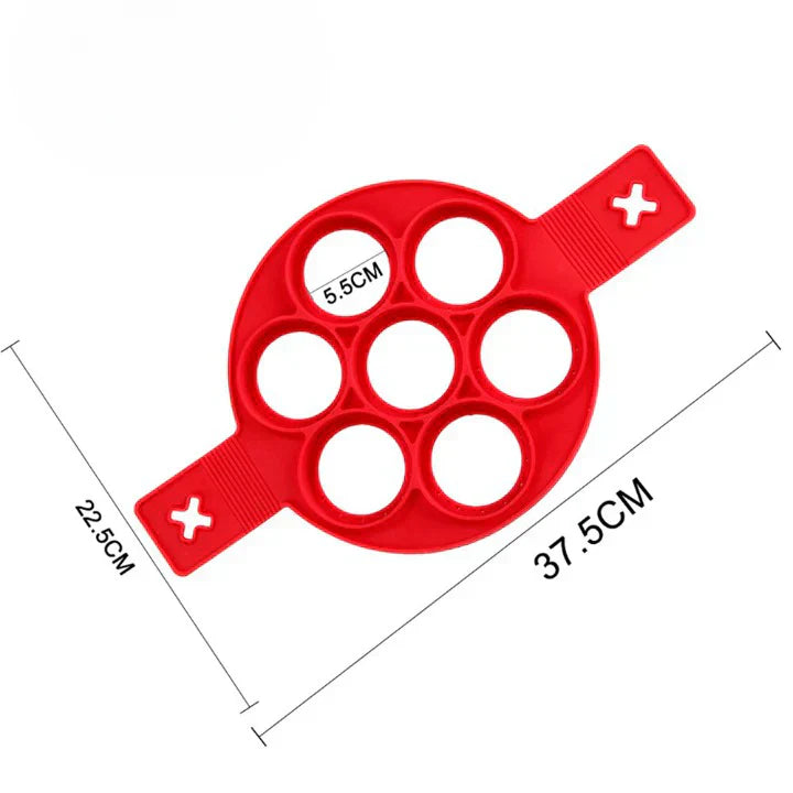"Antihaft-Pfanne mit Pfannkuchen, perfekt portioniert und gleichmäßig geformt, für müheloses Kochen ohne Ankleben."