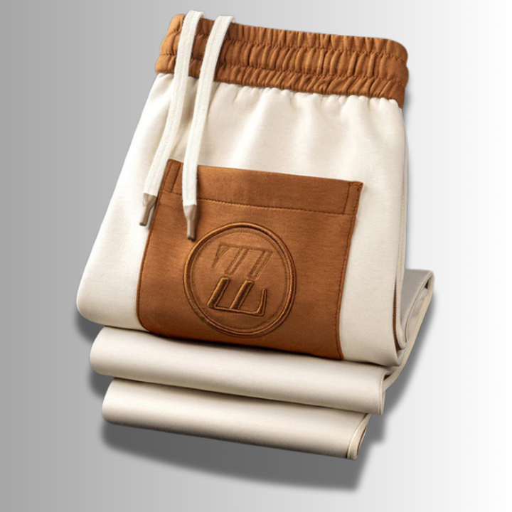 "Atmungsaktiver Herren Jogginganzug, modern geschnitten, grau, mit Kapuze und elastischem Bund für optimalen Tragekomfort."