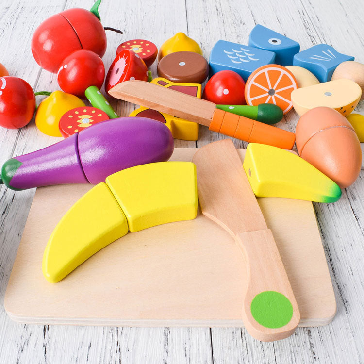 "Buntes Montessori Schneide Spielset aus Holz, featuring buntes Obst und Gemüse, ideal zum Fördern der Feinmotorik."