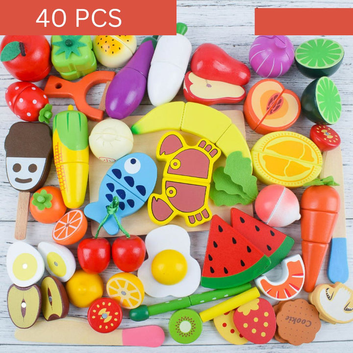 "Buntes Montessori Schneide Spielset aus Holz, featuring buntes Obst und Gemüse, ideal zum Fördern der Feinmotorik."