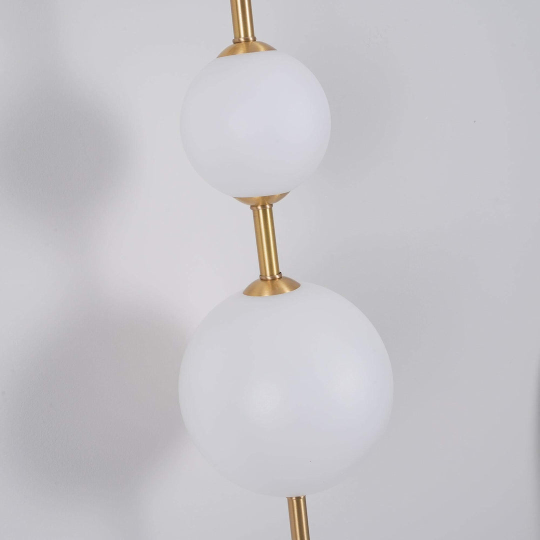 Applique murale boule verticale aspect doré