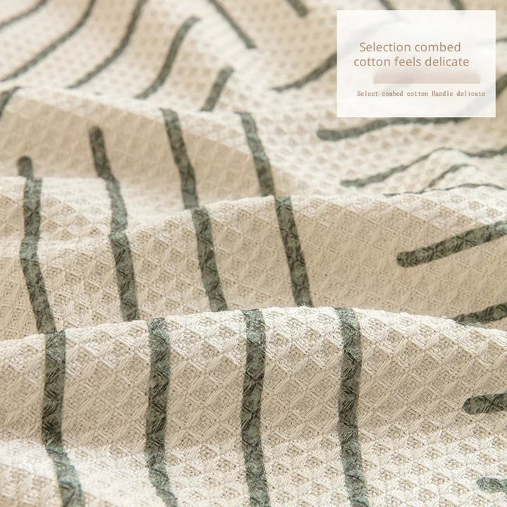 "Elegant skandinavischer Sofabezug mit Quasten, schützend und anpassbar, in verschiedenen Größen und Farben erhältlich."