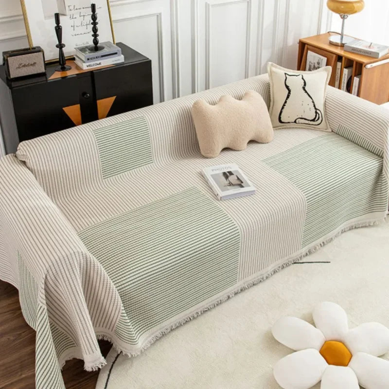 "Elegant skandinavischer Sofabezug mit Quasten, schützend und anpassbar, in verschiedenen Größen und Farben erhältlich."