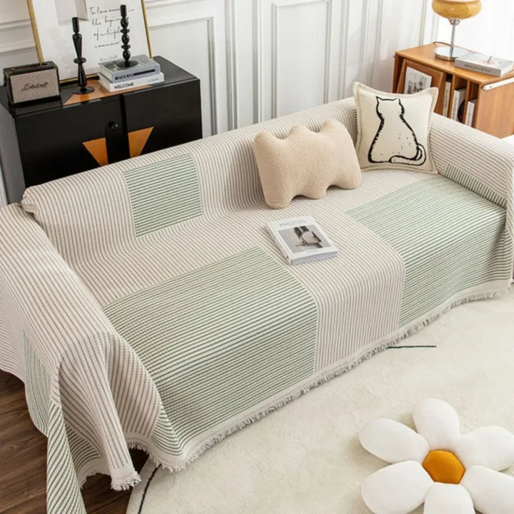 "Elegant skandinavischer Sofabezug mit Quasten, schützend und anpassbar, in verschiedenen Größen und Farben erhältlich."