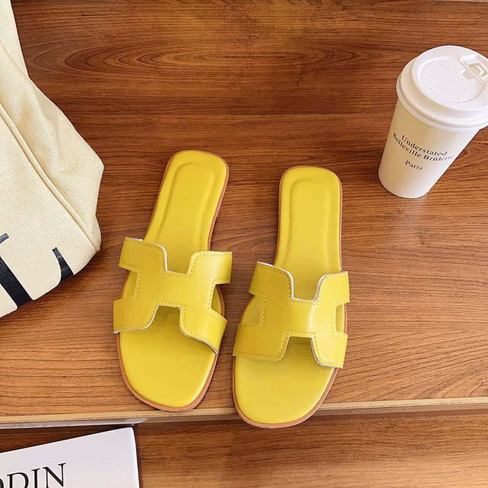 "Elegante H-Profil Leder Sandalen in lebhaften Farben, bequem und modisch, aus hochwertigem Leder gefertigt."