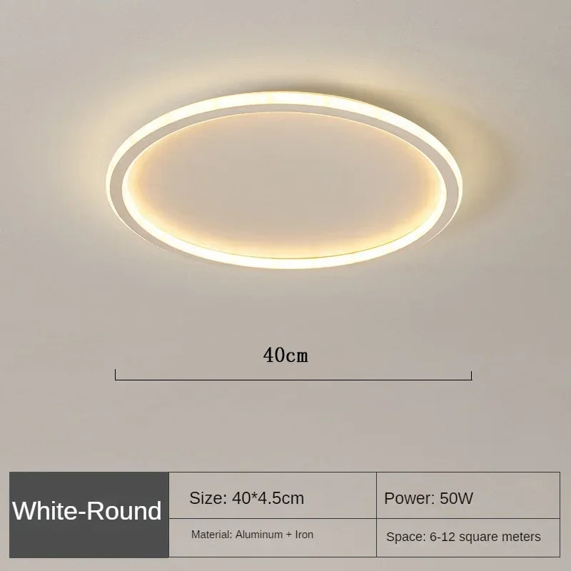 Elegante skandinavische LED-Deckenleuchte, dimmbar, rund, in modernem Esszimmer, warmweißes Licht, 40 cm Durchmesser.