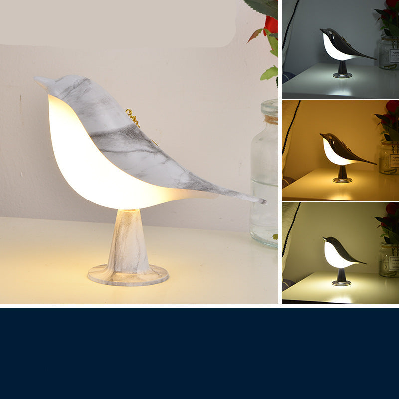 "Elegante vogelförmige Lampe mit drei LED-Leuchtstufen für flexible, energiesparende Beleuchtung und stilvolles Ambiente."