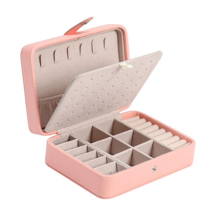 Elegantes Leder Klappdeckel Schmuckkästchen, kompakt in Blau, Rosa, Weiß, für stilvolle Aufbewahrung von Ringen, Ohrringen.