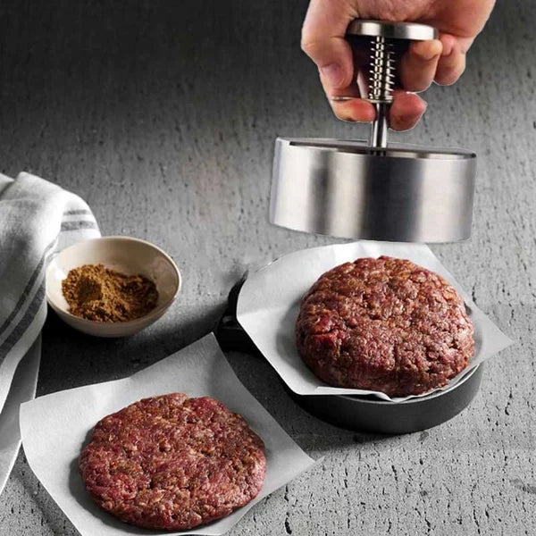 "Ergonomische Hamburgerpresse aus Edelstahl, antihaftbeschichtet für perfekte, gleichmäßige Burger, simple Anwendung."