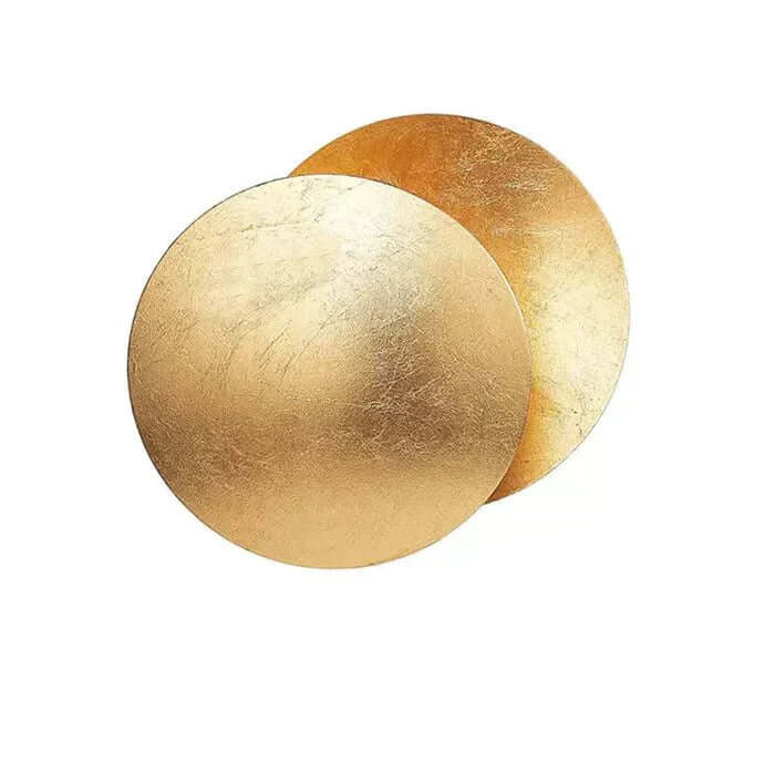 Goldene Wandleuchte mit Sonnenfinsternis-Effekt