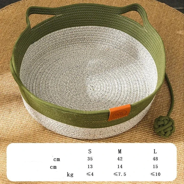 "Handgewebtes ergonomisches Katzenbett aus natürlichem Baumwollseil – stilvoller Schlafplatz, sicher, in Grau gezeigt."
