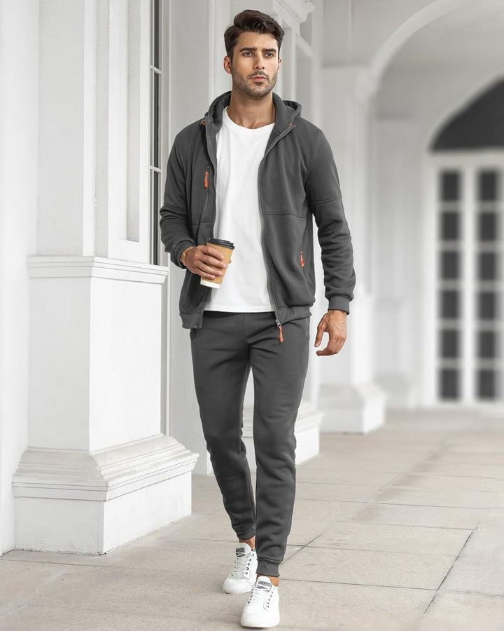 "Herren Slim-Fit-Trainingsanzug atmungsaktiv, dunkelblau, Vorderansicht, stilvoller Look, leichtes Material für Sport & Freiz