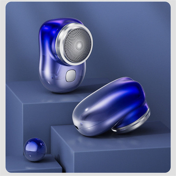 "Kompakter, kabelloser Herrenrasierer mit ergonomischem Design, ideal für präzise und sanfte Körperpflege unterwegs."