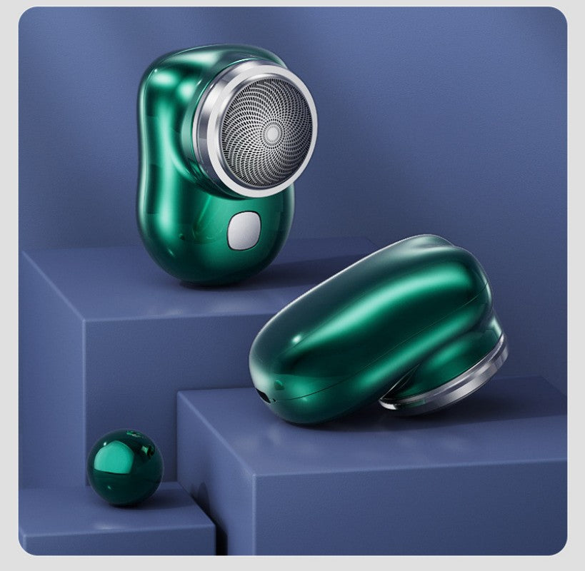 "Kompakter, kabelloser Herrenrasierer mit ergonomischem Design, ideal für präzise und sanfte Körperpflege unterwegs."