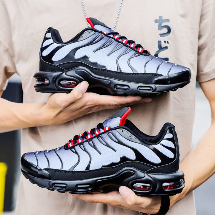 "Laufschuhe mit Air Cushion, schwarz-grau, für Komfort & Stil, rutschfeste Sohle, gepolsterte Innensohle, ideal für Sport."