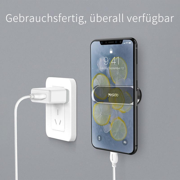 "Magnetische Telefonhalterung im Auto, kompakt mit 6 Magneten, an Armaturenbrett angebracht, montagefrei und sicher."