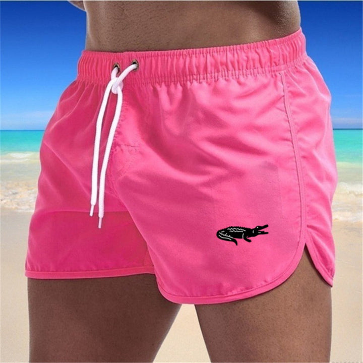 "Mehrfarbige, leichte Strand-Shorts mit elastischem Bund und modernem Druck, perfekt für Sommer und Sport."