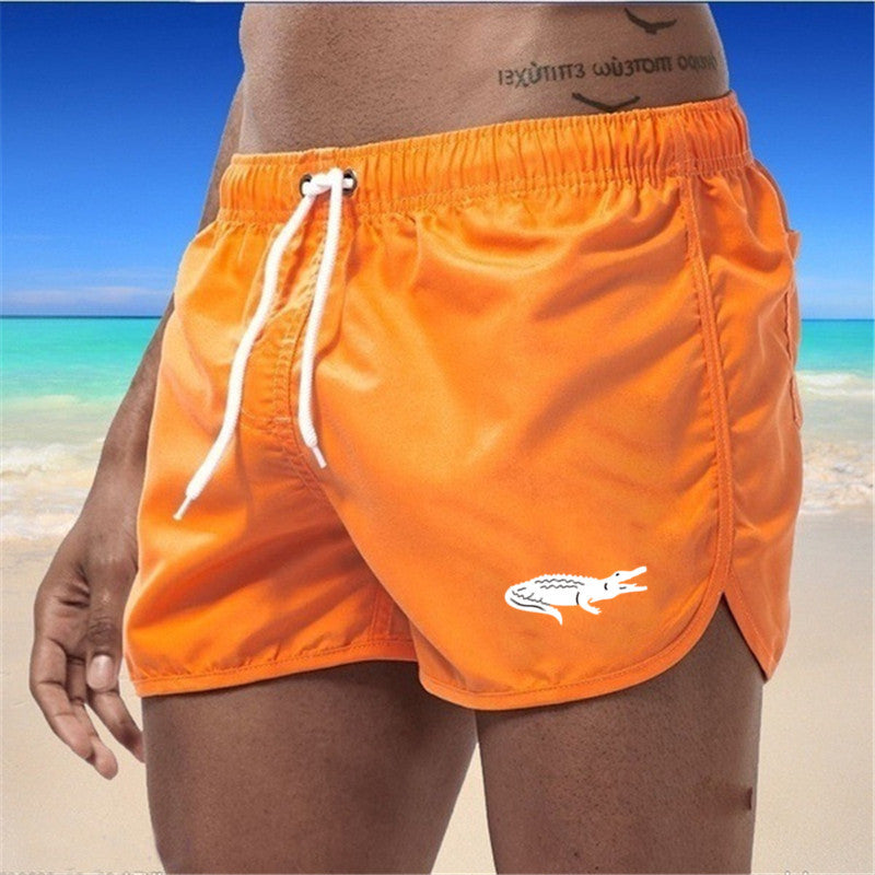 "Mehrfarbige, leichte Strand-Shorts mit elastischem Bund und modernem Druck, perfekt für Sommer und Sport."