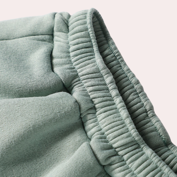 Moderner Damen-Jogginganzug mit tailliertem Schnitt, in Pastellfarben, aus weichem, atmungsaktivem Stoff für Komfort und Stil