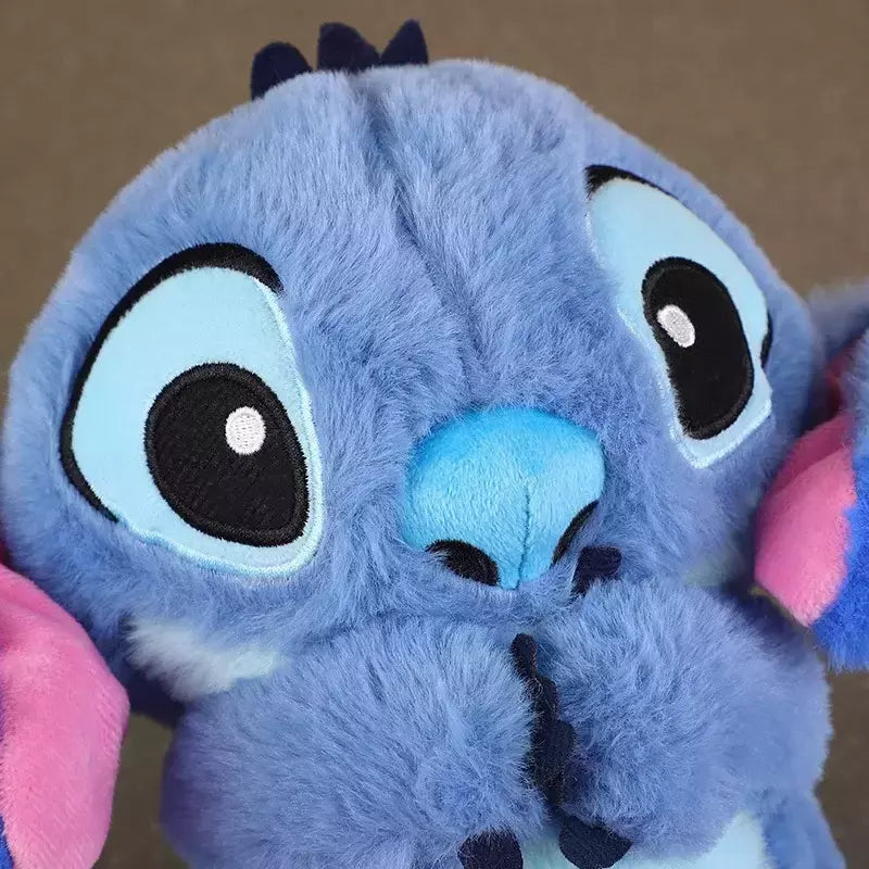 "Niedliches Stofftier Stitch mit integrierten Lichtern und Musik, ideal für beruhigenden Schlaf und Disney-Fans."