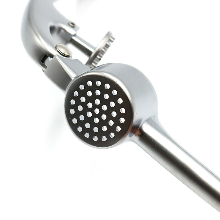 "Premium Edelstahl Knoblauchpresse, robust, ergonomisch, müheloses Zerdrücken von Knoblauch, ideale Küchenhilfe."