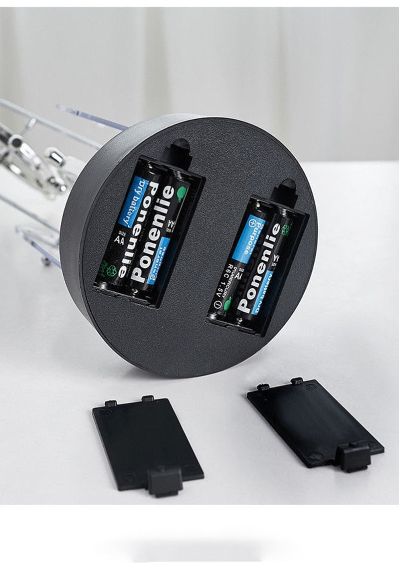 Rotierendes Perpetuum Mobile-Pendel, dekoratives Ornament mit edlem Doppel-Dreifachring-Design, still und hypnotisch.