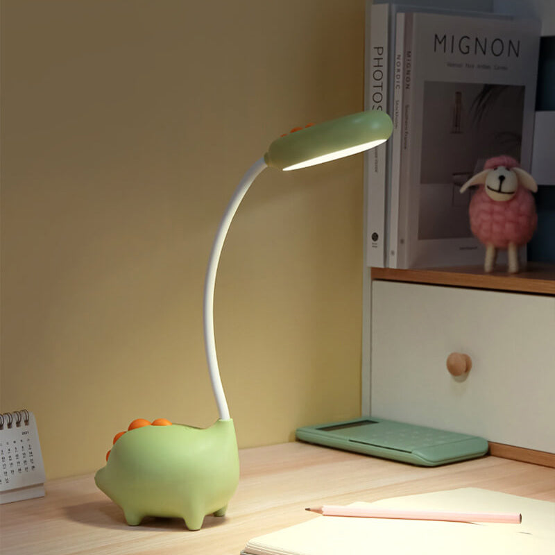 Sandsberg LED-Schreibtischlampe in Dinosaurier-Form, augenfreundlich, wiederaufladbar, ideal für Kinderzimmer.