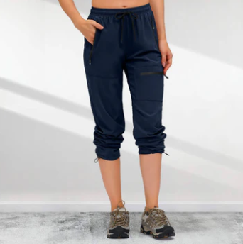 "Schnelltrocknende Damen Cargo Wanderhose, leicht, beige, Taschen, ideal für Outdoor-Aktivitäten und Alltag."