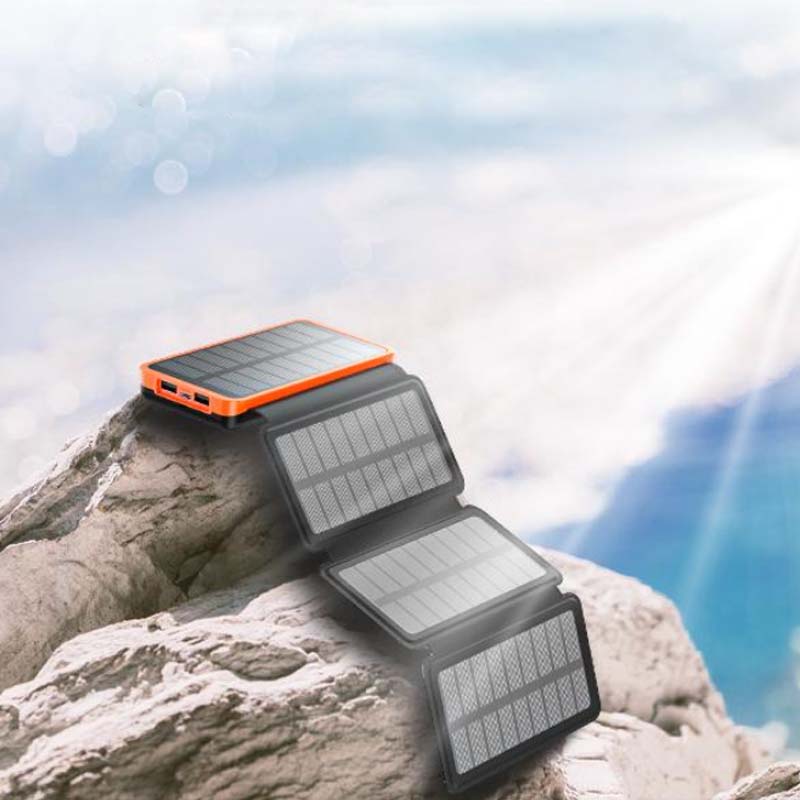 Solarbetriebene Powerbank 25000mAh mit vier Solarpanels, LEDs, robustem Design für Outdoor-Abenteuer und schnellem Laden.