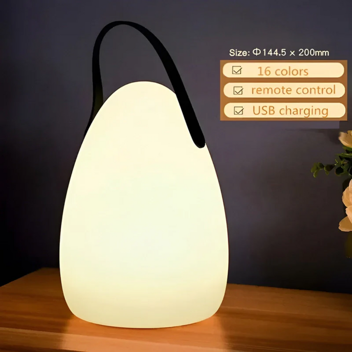 "Tragbare wasserfeste LED Tischlampe in modernem Design, ideal für drinnen und draußen, kabellos und langlebig."