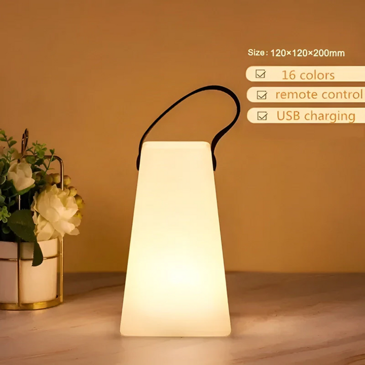"Tragbare wasserfeste LED Tischlampe in modernem Design, ideal für drinnen und draußen, kabellos und langlebig."