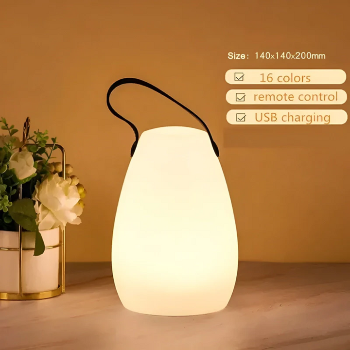 "Tragbare wasserfeste LED Tischlampe in modernem Design, ideal für drinnen und draußen, kabellos und langlebig."