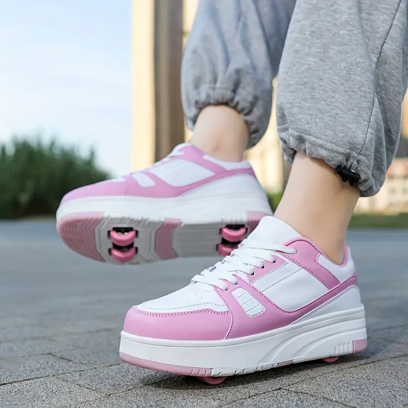 "Trendige Rollschuhe für Kinder mit versteckten Rollen, rosa-schwarzes Design, ideal für Outdoor-Abenteuer und Bewegung"