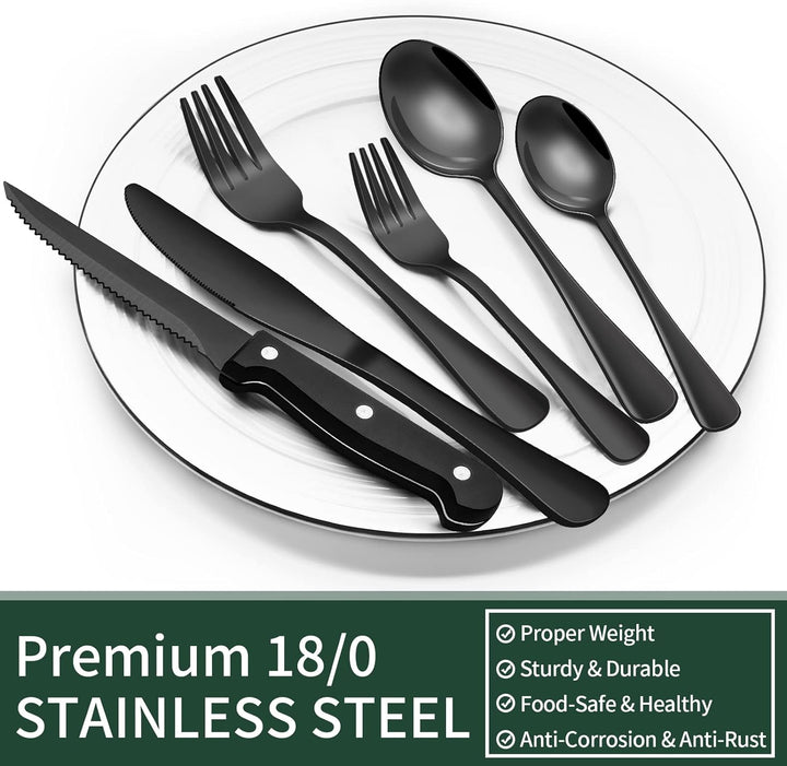 "24-teiliges schwarzes Besteckset aus Edelstahl mit elegantem, mattem Design auf einem stilvoll gedeckten Tisch"