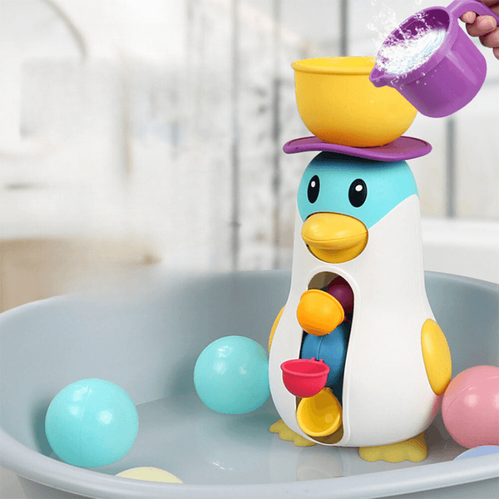 Dreh-Spitz-Badespaß - Wasserrad-Pinguin Spielzeug