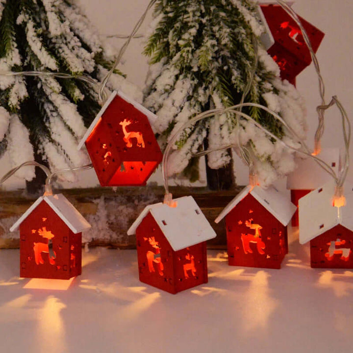 Hängende Holz-Weihnachtshäuser mit LED