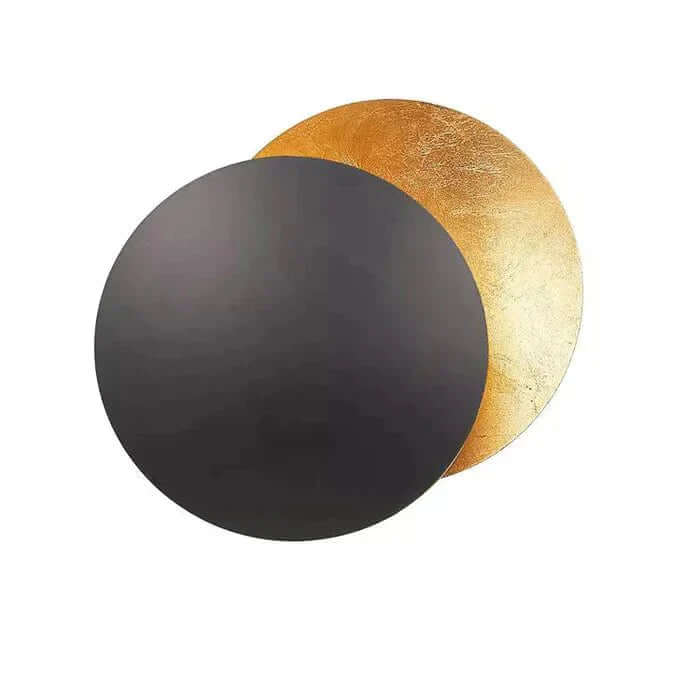Goldene Wandleuchte mit Sonnenfinsternis-Effekt