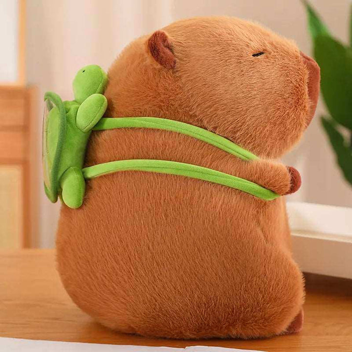 Peluche Capybara câline avec sac à dos