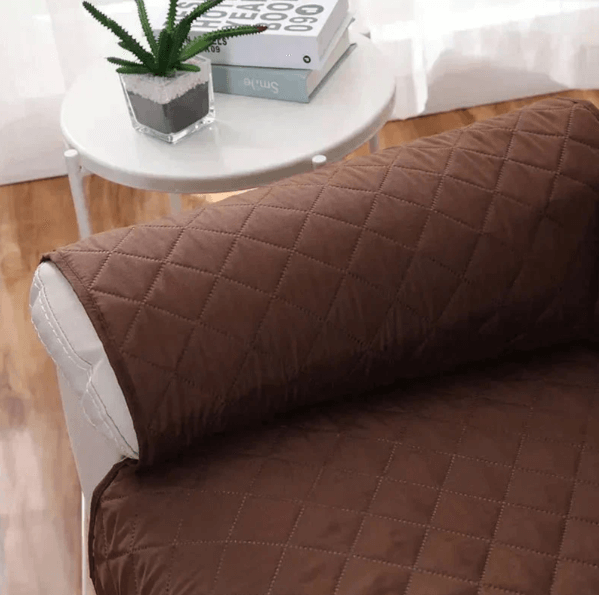 Housse de fauteuil extensible - protection et style pour votre canapé