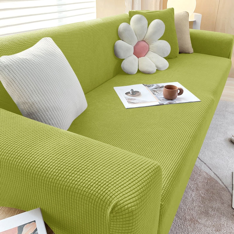 Beige Sofahusse aus elastischem Stretchmaterial, perfekter Sitz, Schutz vor Flecken, Schmutz und Tierhaaren.